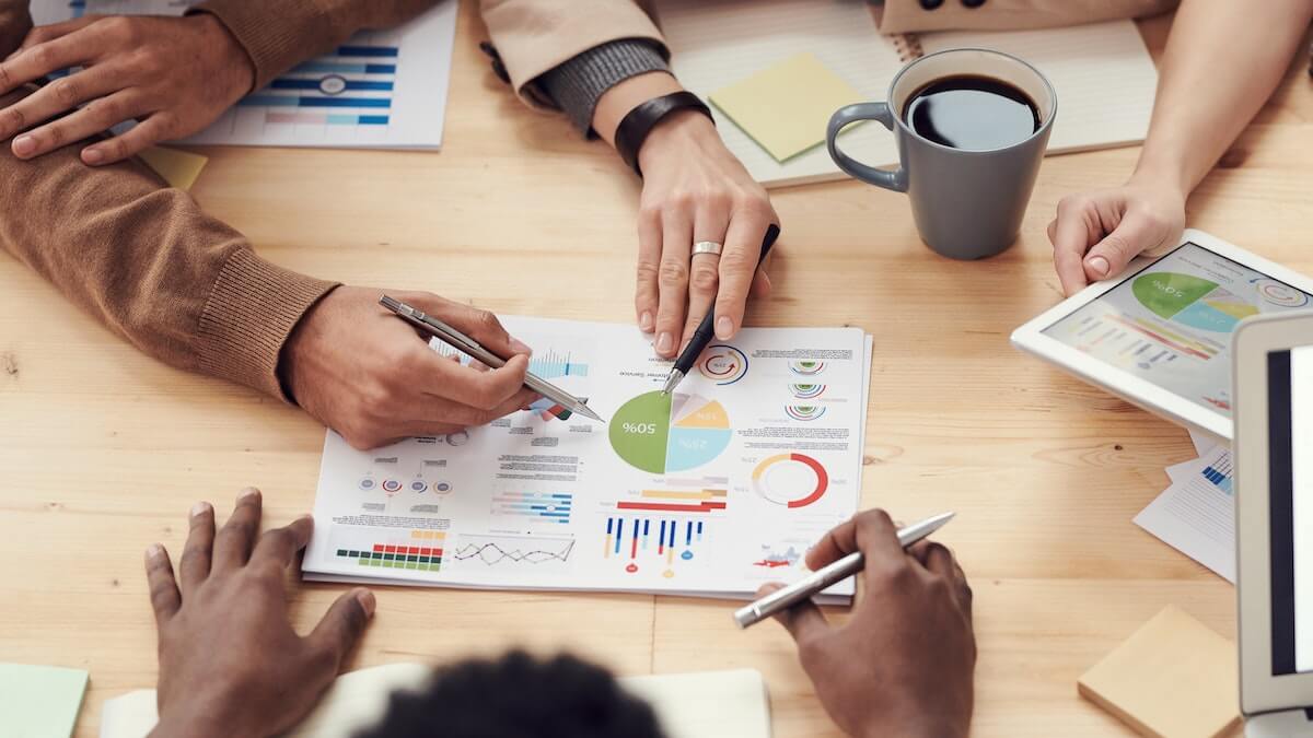 team reviewing business report